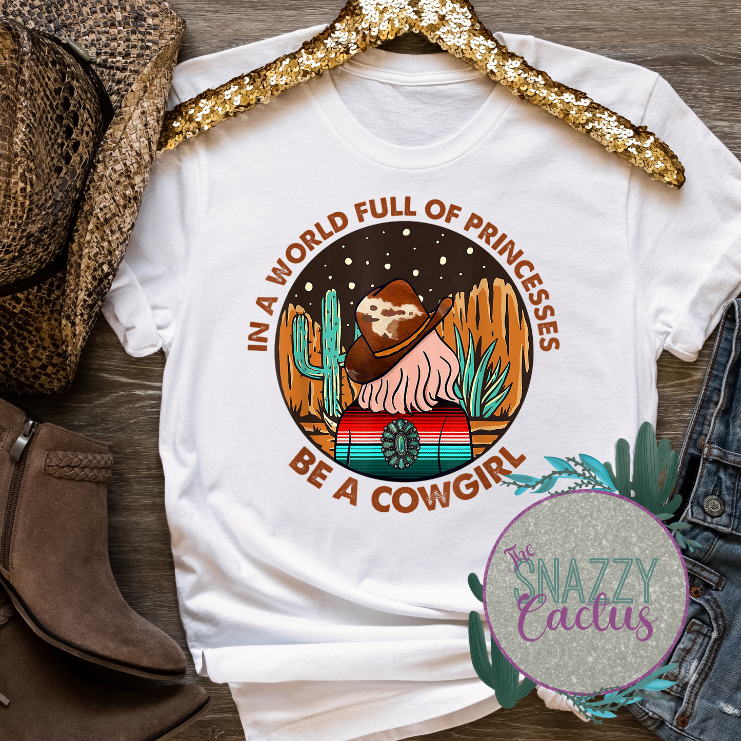 In a World Full Of Princesses Be A Cowgirl Tee